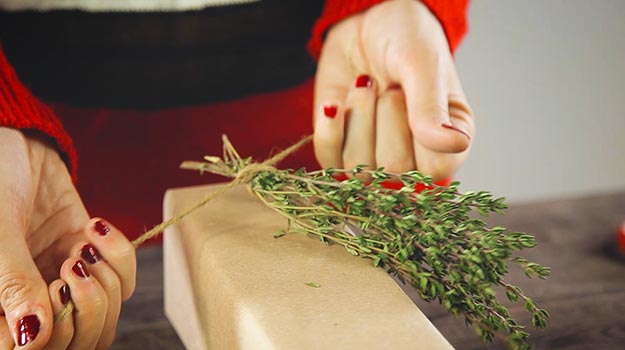 Attach some fresh herbs to the present with jute rope. 