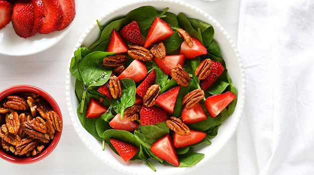 Strawberry and maple spinach salad