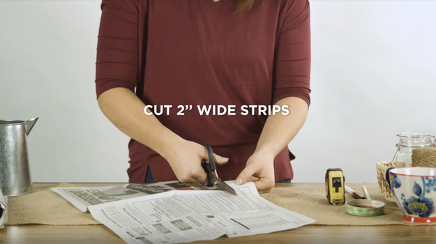 Cut two-inch-wide newspaper strips