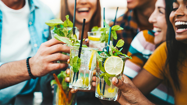 Garden celebration: friends raising their glasses