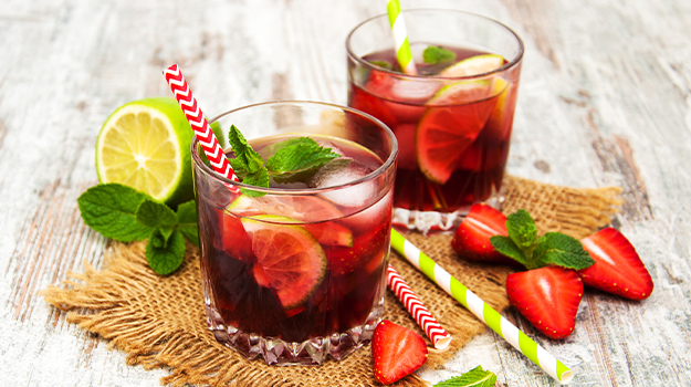 Photo of a summer cocktail made with fruit